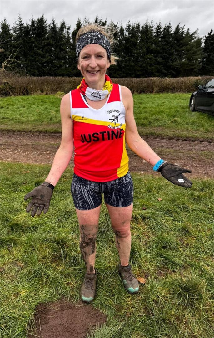Justine looking very muddy